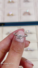 Load and play video in Gallery viewer, best moissanite engagement ring with petal prongs in gold
