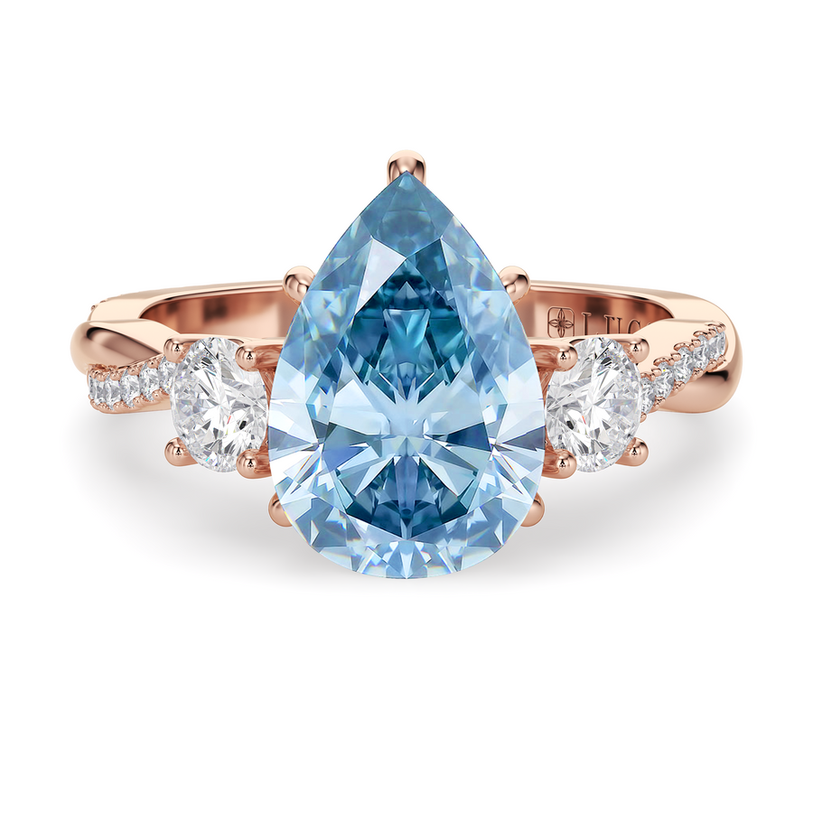 Load image into Gallery viewer, LUCCE Twisting Pear Pavé Trio Blue Diamond Engagement Ring with Petal Prongs in Gold or Platinum
