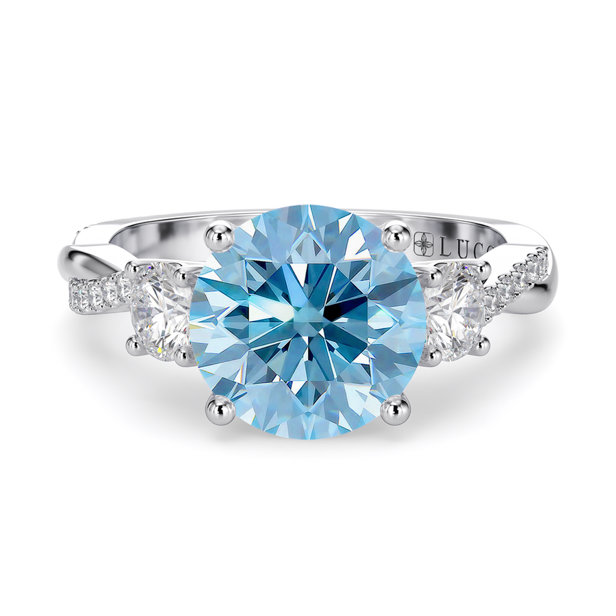 Load image into Gallery viewer, LUCCE Twisting Pavé Round Trilogy Blue Diamond Engagement Ring with Petal Prongs in Gold or Platinum
