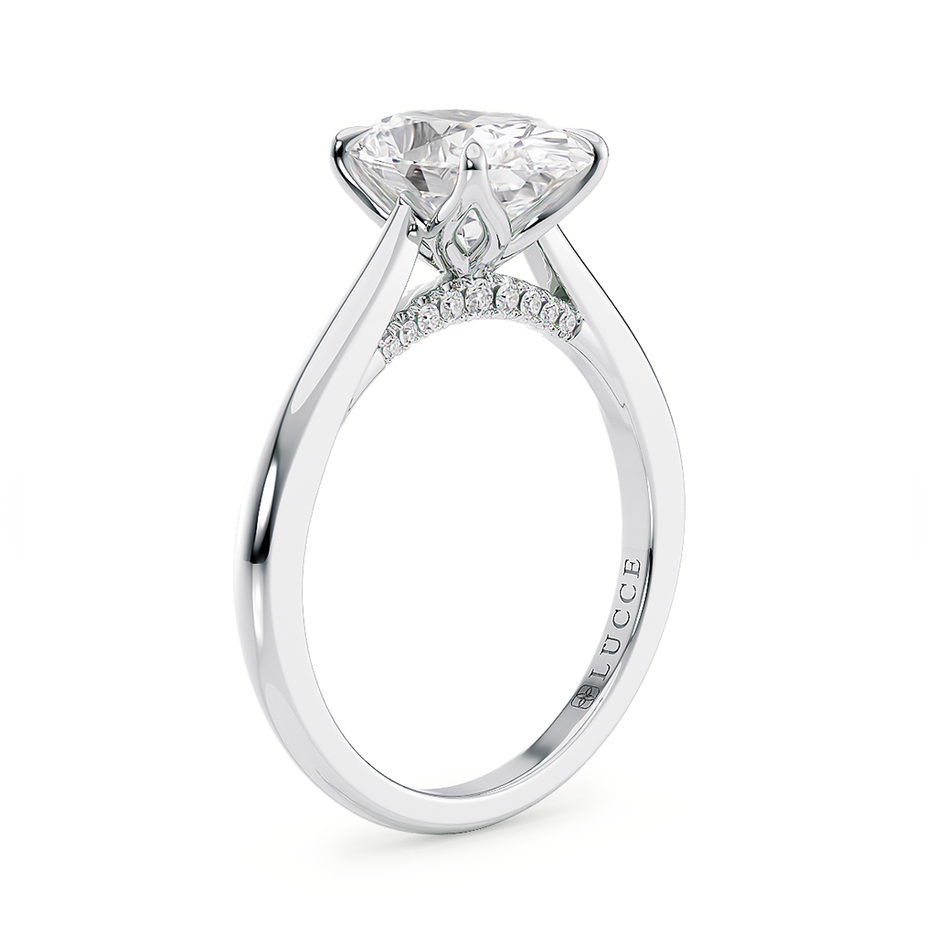Load image into Gallery viewer, LUCCE Cathedral Oval Diamond Solitaire Engagement Ring with Petal Prongs and Hidden Accent Stones in Gold or Platinum
