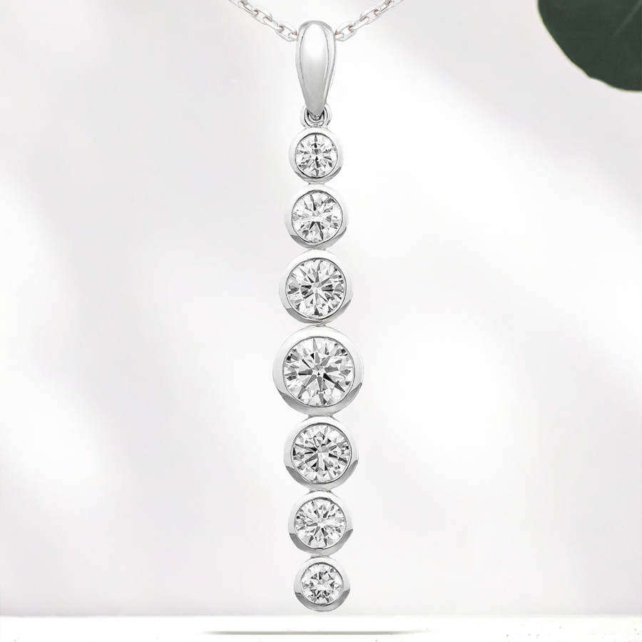 Load image into Gallery viewer, LUCCE Tapered Round Diamond Pendant Necklace in Gold or Platinum
