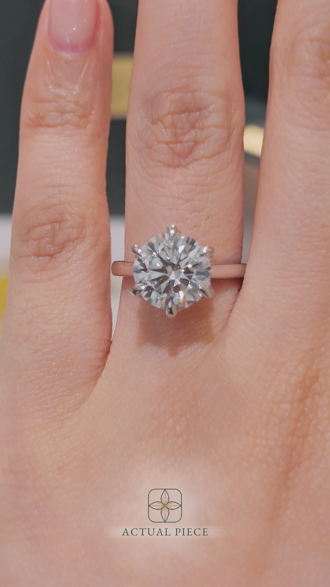 Load and play video in Gallery viewer, LUCCE Cathedral Round Diamond Solitaire Engagement Ring with Petal Prongs and Hidden accent Stones in Gold or Platinum
