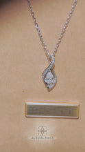 Load and play video in Gallery viewer, Lucce Fiore Infinity Pear Necklace Natural Diamond 0.50ctw (0.30ct F VS2 Ex GIA Center Stone) 18K White Gold
