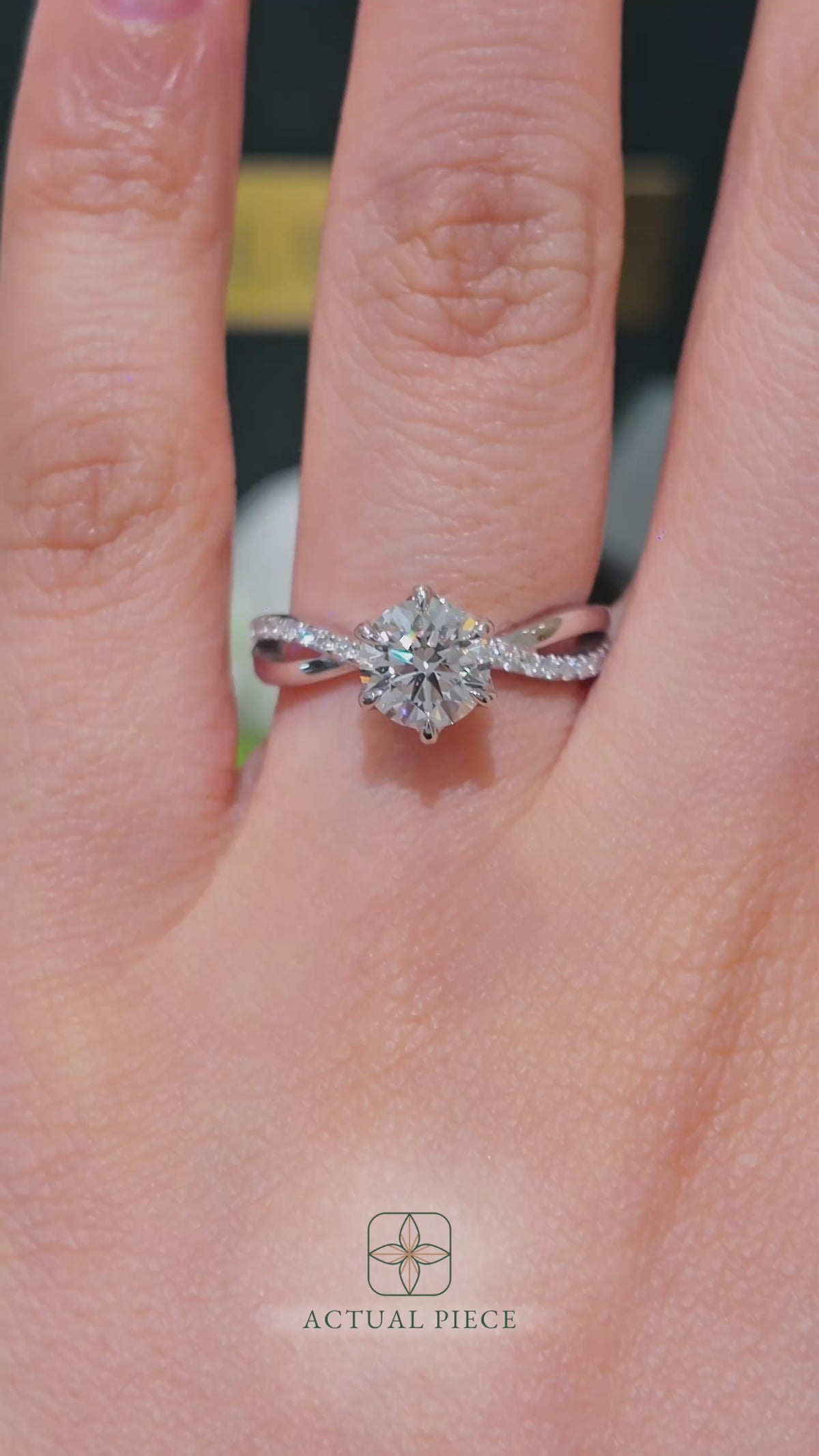 Load and play video in Gallery viewer, LUCCE Infinity Twisting Pavé Round Diamond with Petal Prongs in Gold or Platinum
