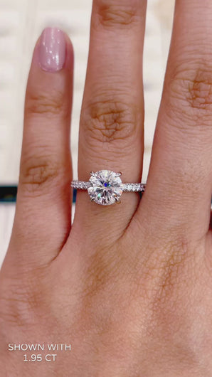 best moissanite engagement ring with tri row band and hidden halo in gold