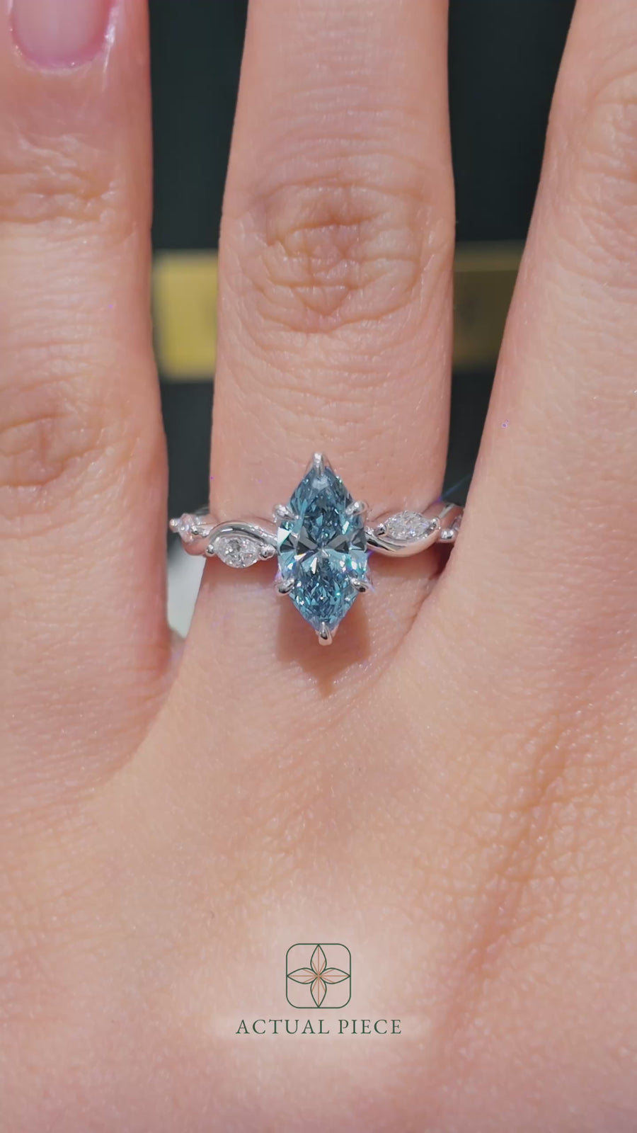 Load and play video in Gallery viewer, LUCCE OCEAN Blue Marquise cut Diamond Ring with Marquise Accents in Intertwining Vines and Petal Prongs Mid Setting Engagement Ring in Gold or Platinum 
