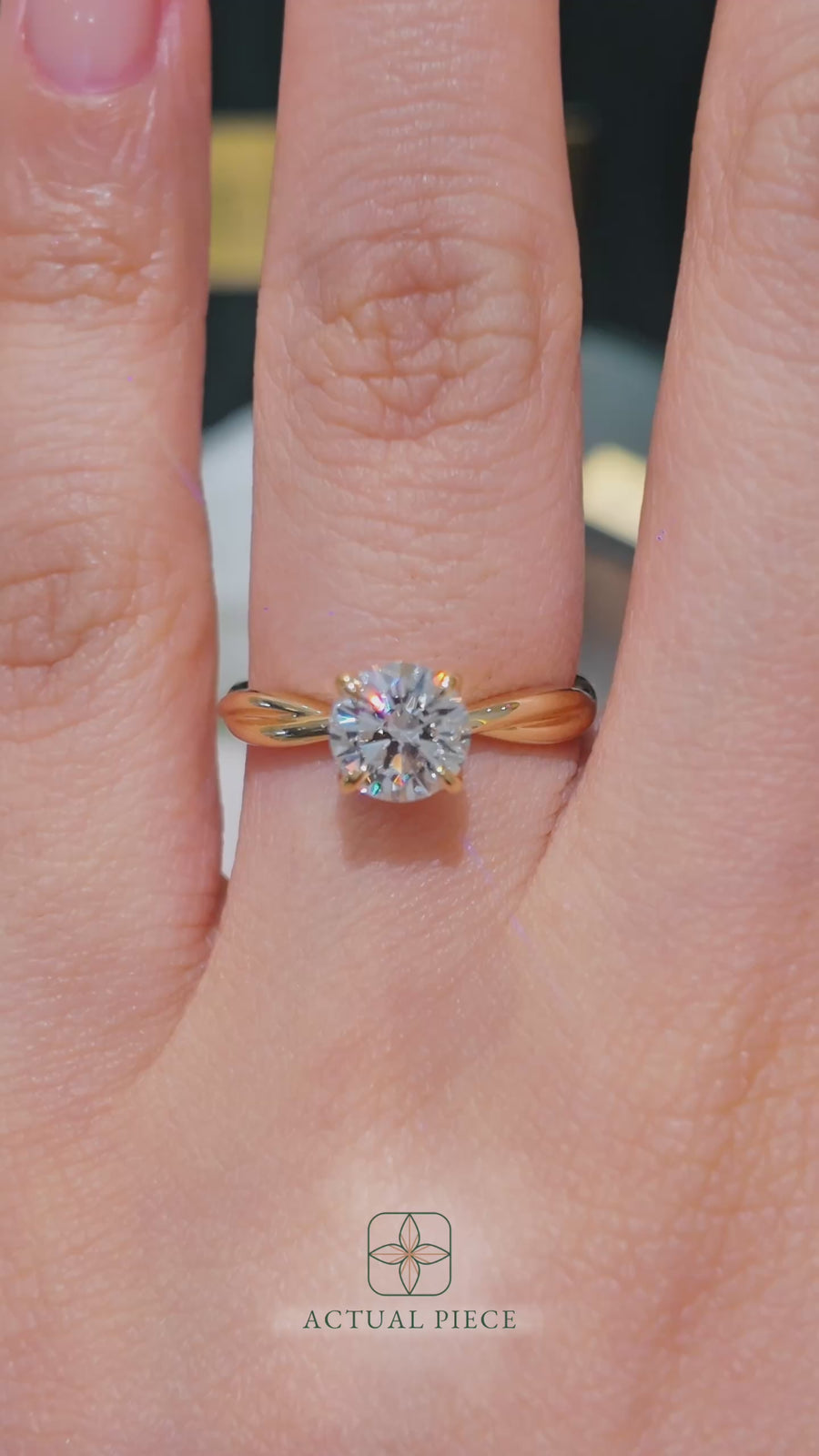 Load and play video in Gallery viewer, LUCCE Twisting Round Solitaire Diamond Engagement Ring with Petal Prongs in Gold or Platinum
