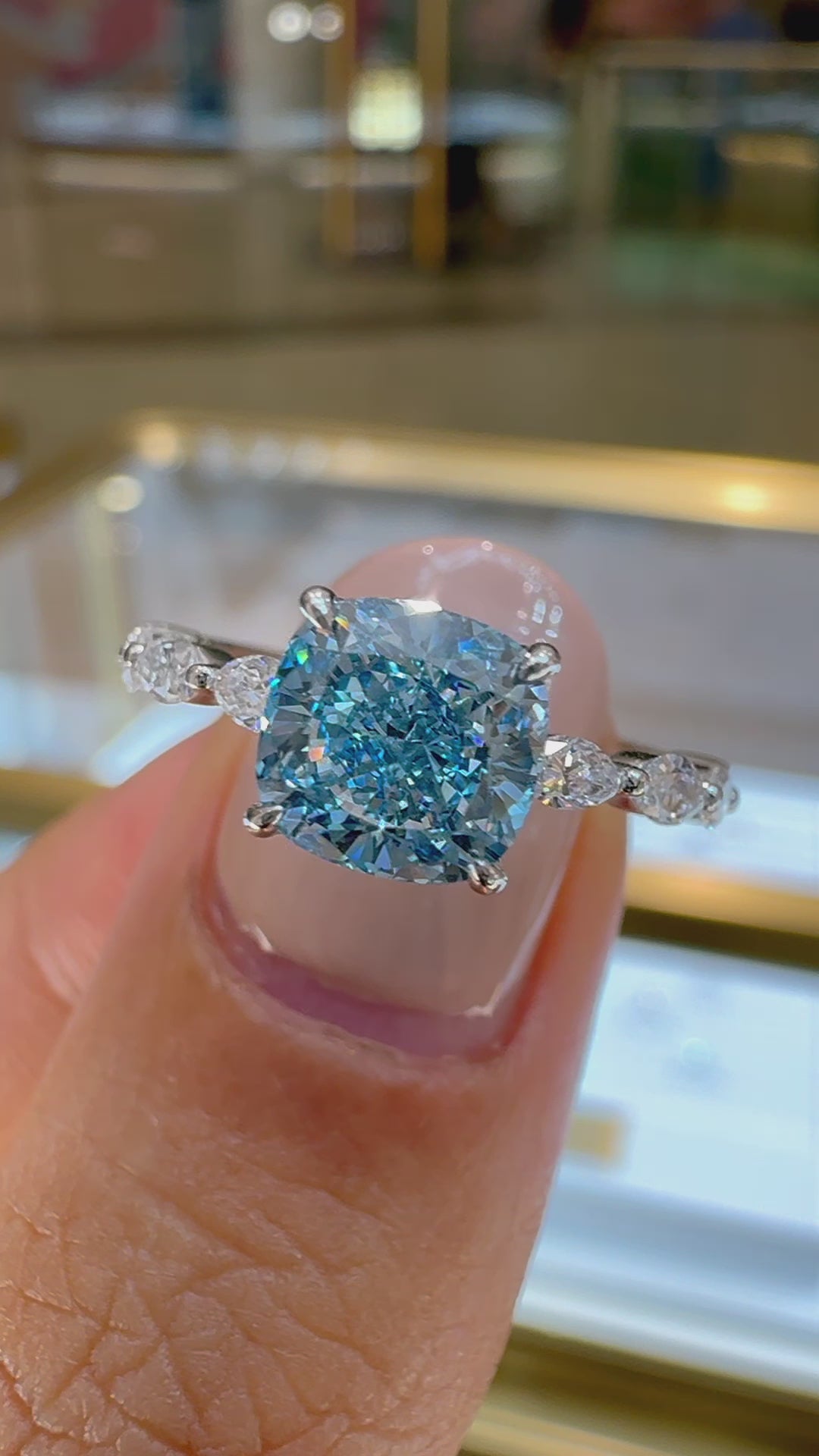 Load and play video in Gallery viewer, Blue Cushion Diamond Engagement Ring with Marquise and Round Accent Band with Petal Prong in Gold or Platinum, Manila Philippines
