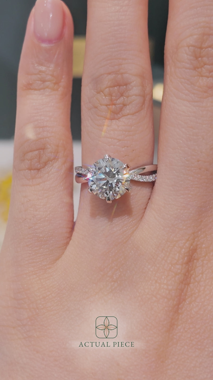 Load and play video in Gallery viewer, LUCCE Infinity Twisting Pavé Round Diamond with Petal Prongs in Gold or Platinum
