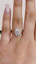 Load and play video in Gallery viewer, Oval Moissanite Engagement Ring with Hidden Halo in Gold
